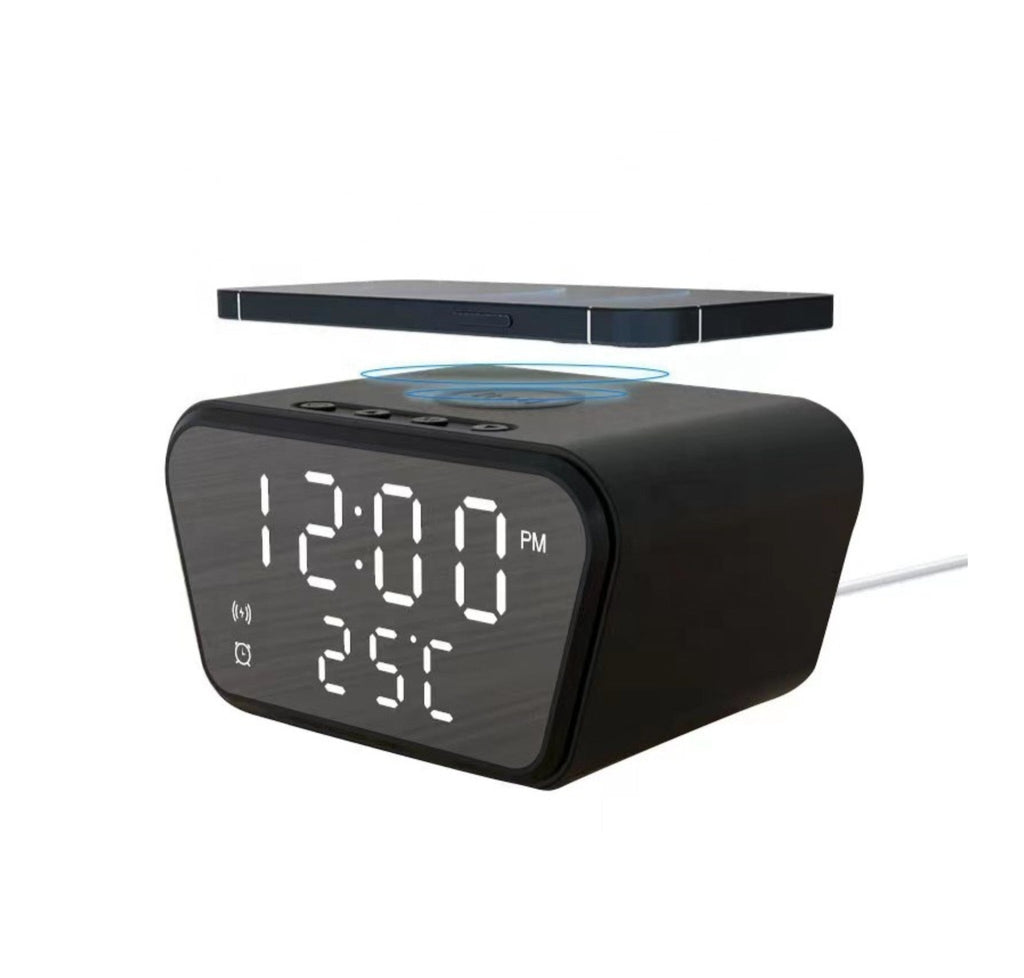 AY-21 black alarm clock charging a phone